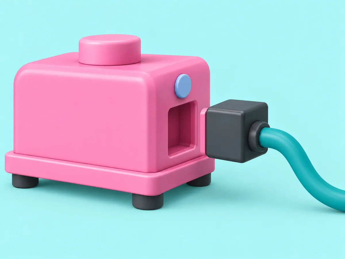 A machine with a square socket in its side and a plug on a cable about to seat in it.